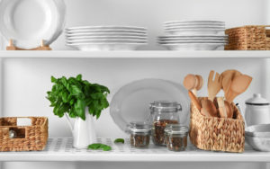 Storage stand with kitchenware, indoors
